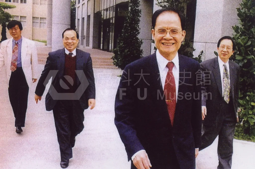 Four people are walking。